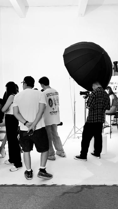 Photographers working in a studio